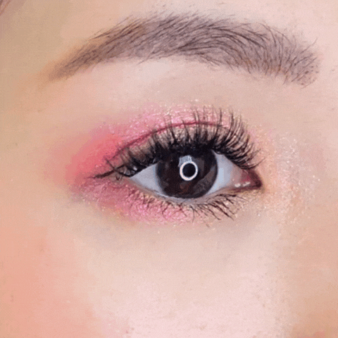 Close up video of a female model's right eye repeatedly blinking and wearing HanaDolly's BARBIE lash style to showcase the DIY lashes in action