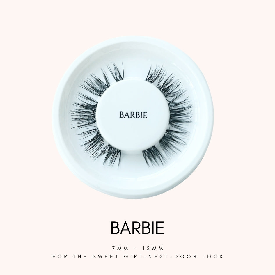 Close up view of HanaDolly's BARBIE lash style on their iconic white, circular lash tray