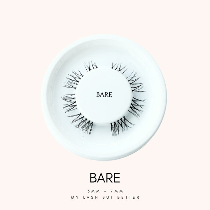 Close up view of HanaDolly's BARE lash style on their iconic white, circular lash tray