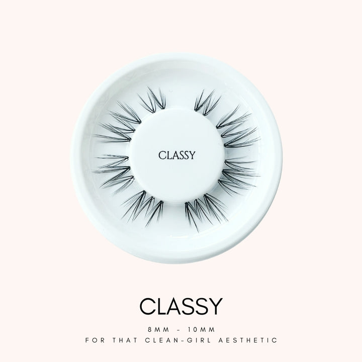 Close up view of HanaDolly's CLASSY lash style on their iconic white, circular lash tray