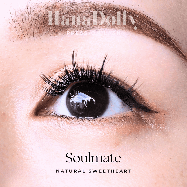 Close up of beautiful model's eye wearing HanaDolly Soulmate press on lashes to showcase the self adhesive lashes in action