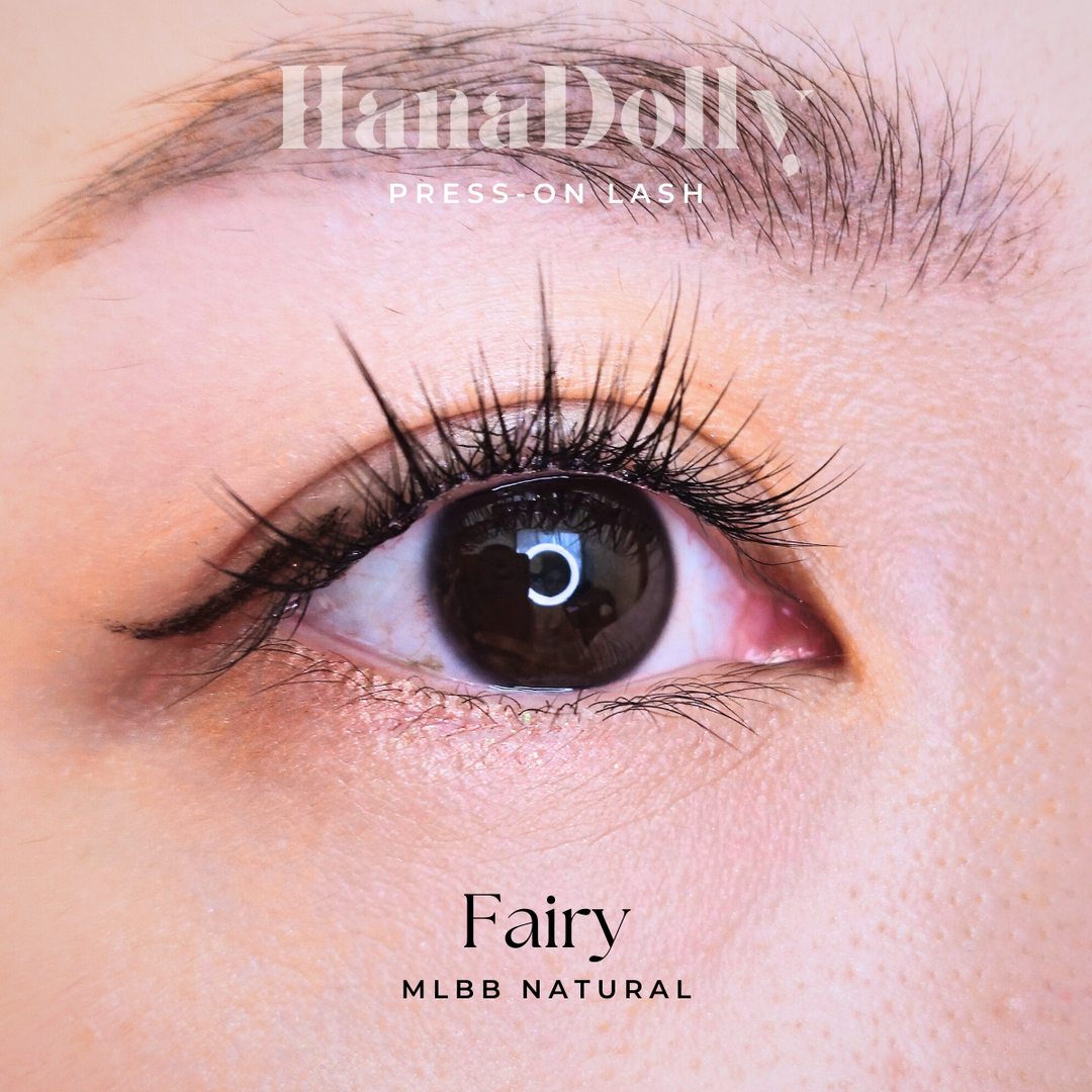 Close up of beautiful model's eye wearing HanaDolly FAIRY press on lashes to showcase the self adhesive lashes in action