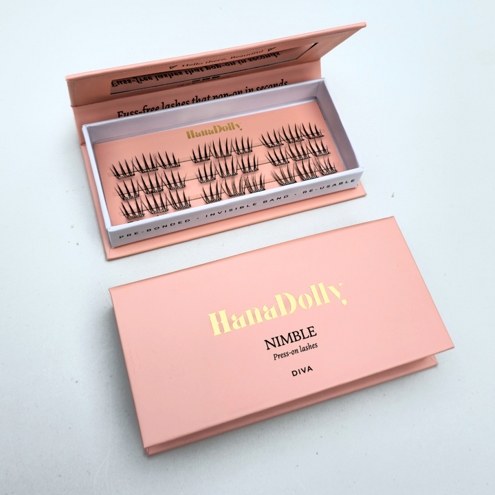 HanaDolly's DIVA self-adhesive lashes displayed with display open box on top and closed box below