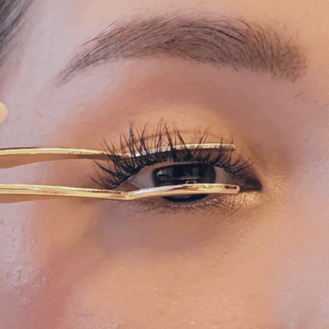 Final pinch to secure natural-looking DIY lash extensions